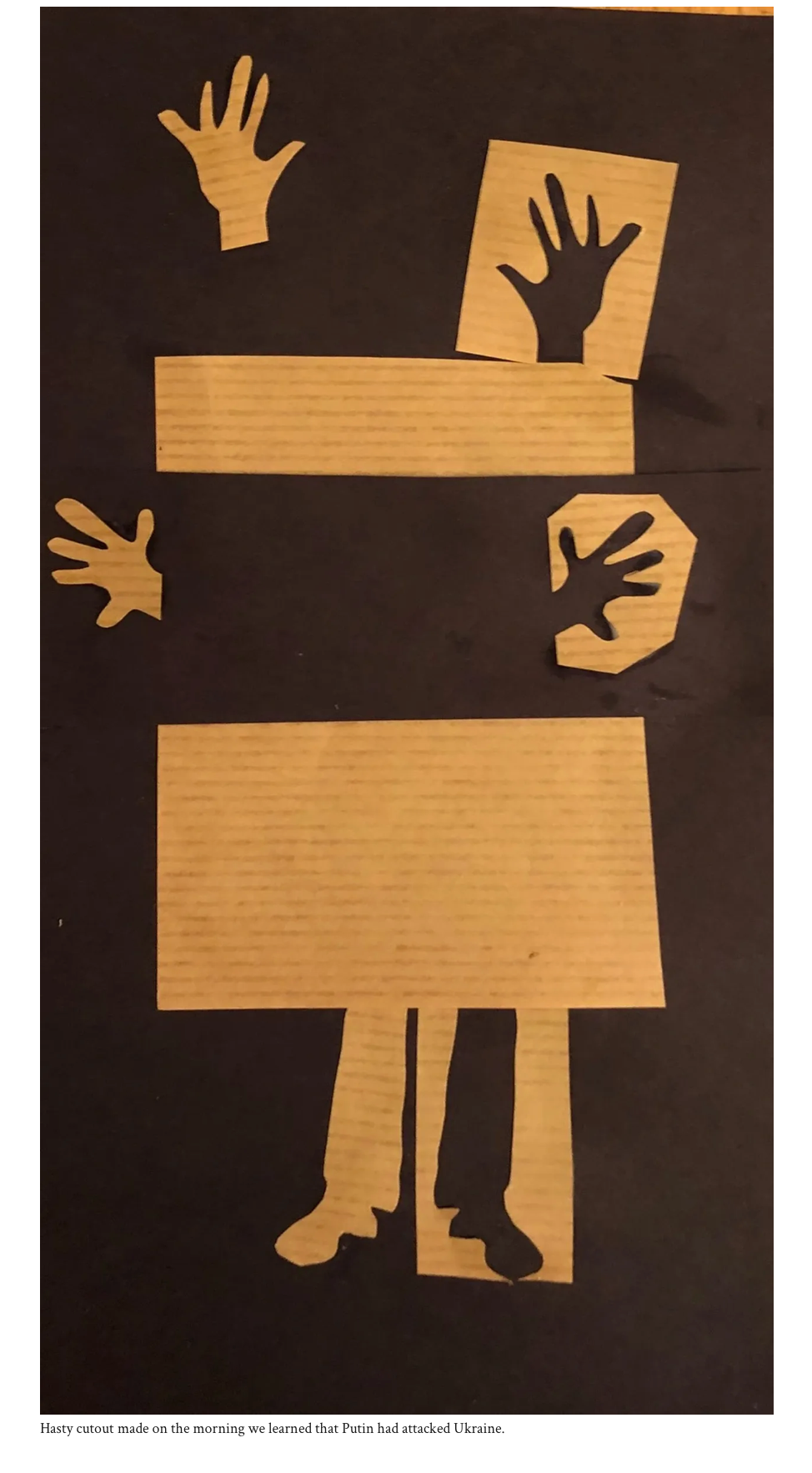 Hasty Cutout – cardboard cutout on black background by Susan Hulsman Bingham